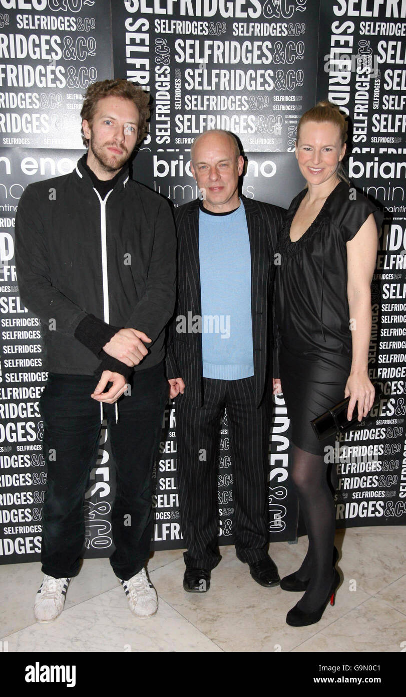 (left to right) Chris Martin, Brian Eno and Alannah Weston attends an installation entitled Luminous, by sound and light artist Brian Eno, at Selfridges in central London. Stock Photo