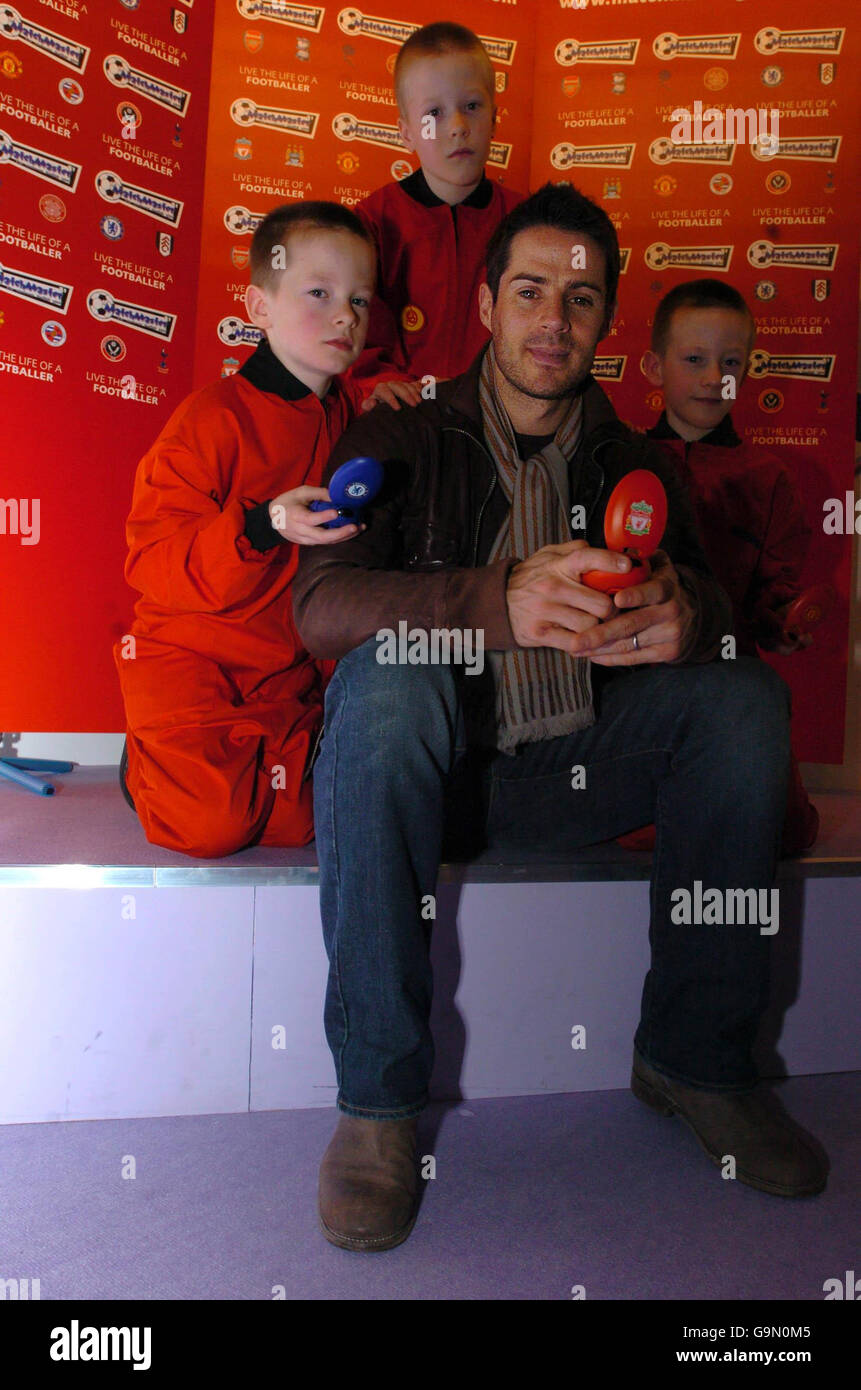 Jamie Redknapp and the triplet toy test team unveil the new Matchmaster electronic football game at the Toyfair 2007 at the ExCel Centre in east London. Stock Photo