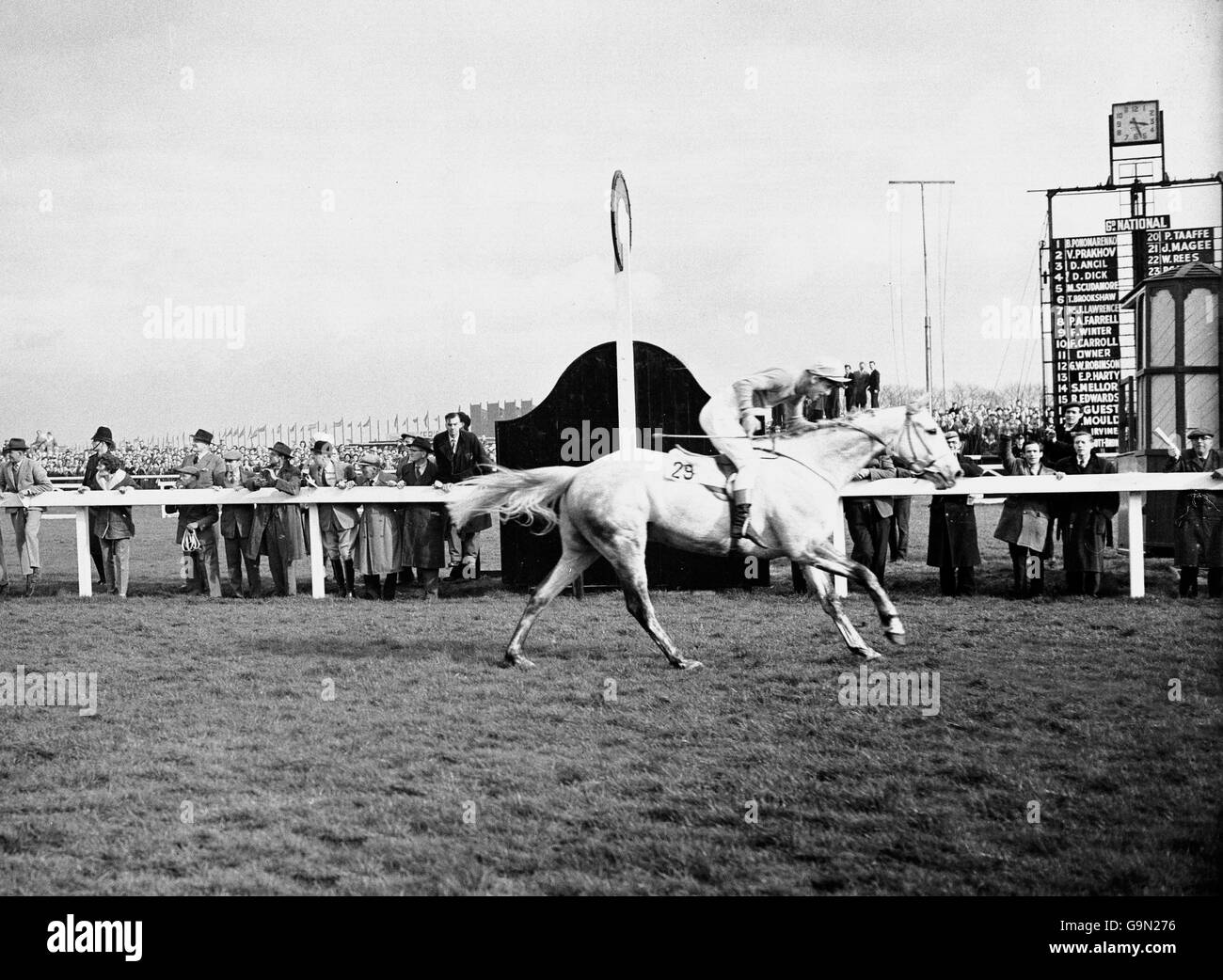 Horse Racing - The Grand National - Aintree. Nicolaus Silver, ridden by Bobby Beasley, comes home to win the National Stock Photo