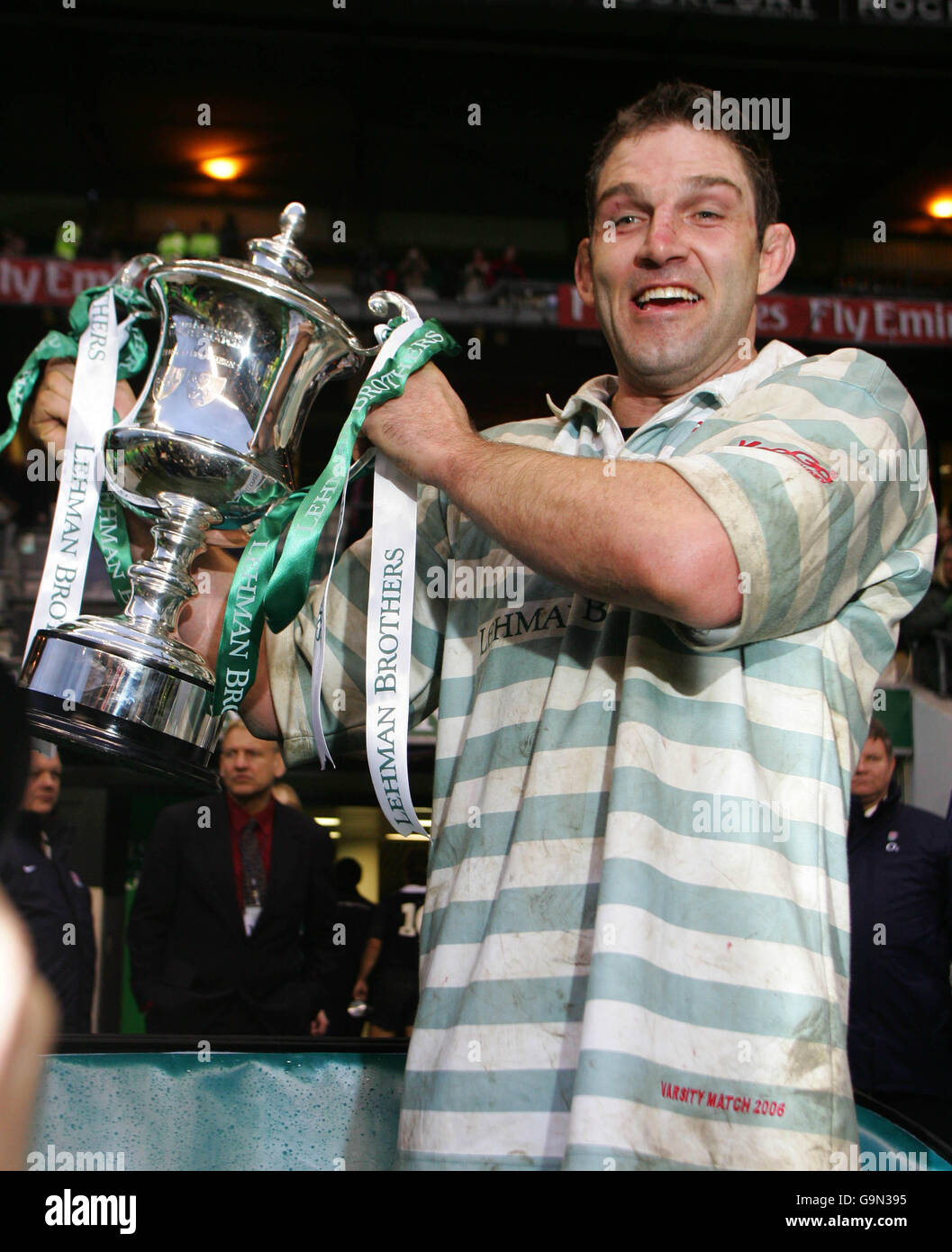 Cambridge's captain and try scorer John Blaikie celebrates with the trophy at the end of the game Stock Photo