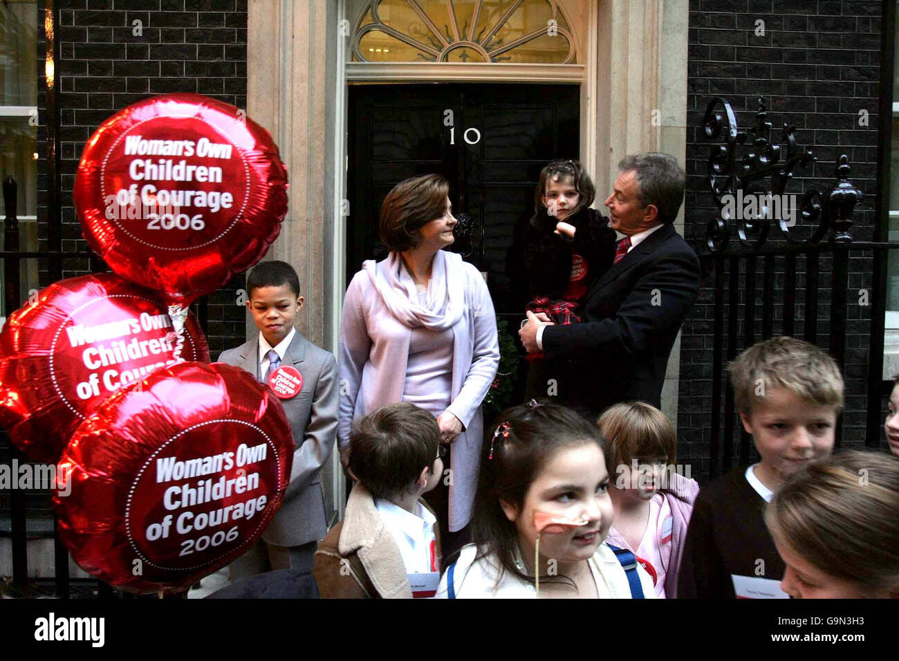 Prime Minister Tony Blair and wife Cherie greet the Woman's Own