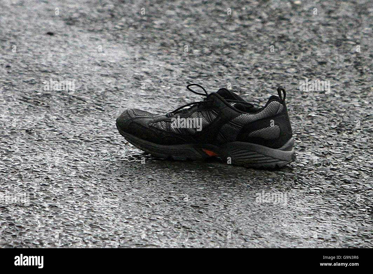 A shoe at the scene in Dromad, near the border town of Dundalk, Co Louth, after one man died and another was left fighting for his life following a clash with car thieves. Stock Photo