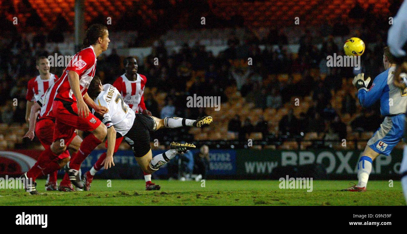Port Vale's George Pilkington (mid-air) scores against Brentford during the Coca-Cola League One match at Vale Park, Stoke-on-Trent. Stock Photo