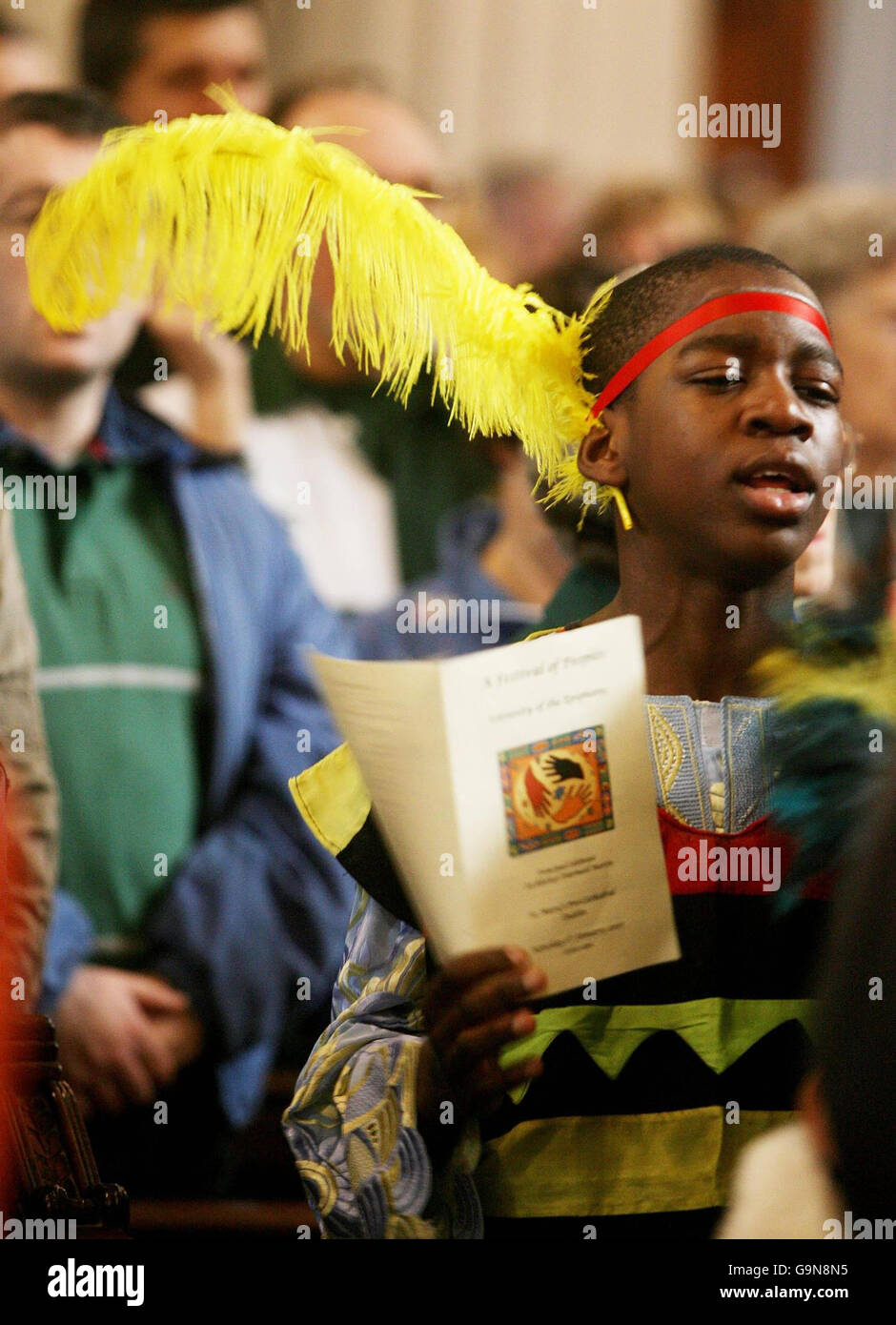 A young african man takes part a multicultural mass to mark the Feast of the Epiphany at the Pro Cathedral in Dublin. Stock Photo