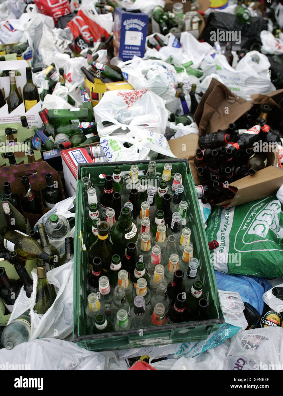 Overflowing bottle banks Stock Photo Alamy