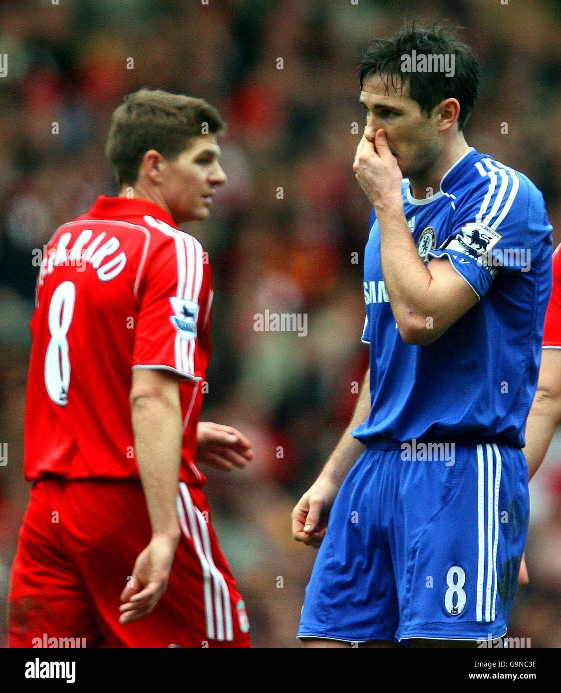 Chelsea's Frank Lampard looks dejected as Liverpool's Steven Gerrard walks  past during the Barclays Premiership match at Anfield, Liverpool Stock  Photo - Alamy