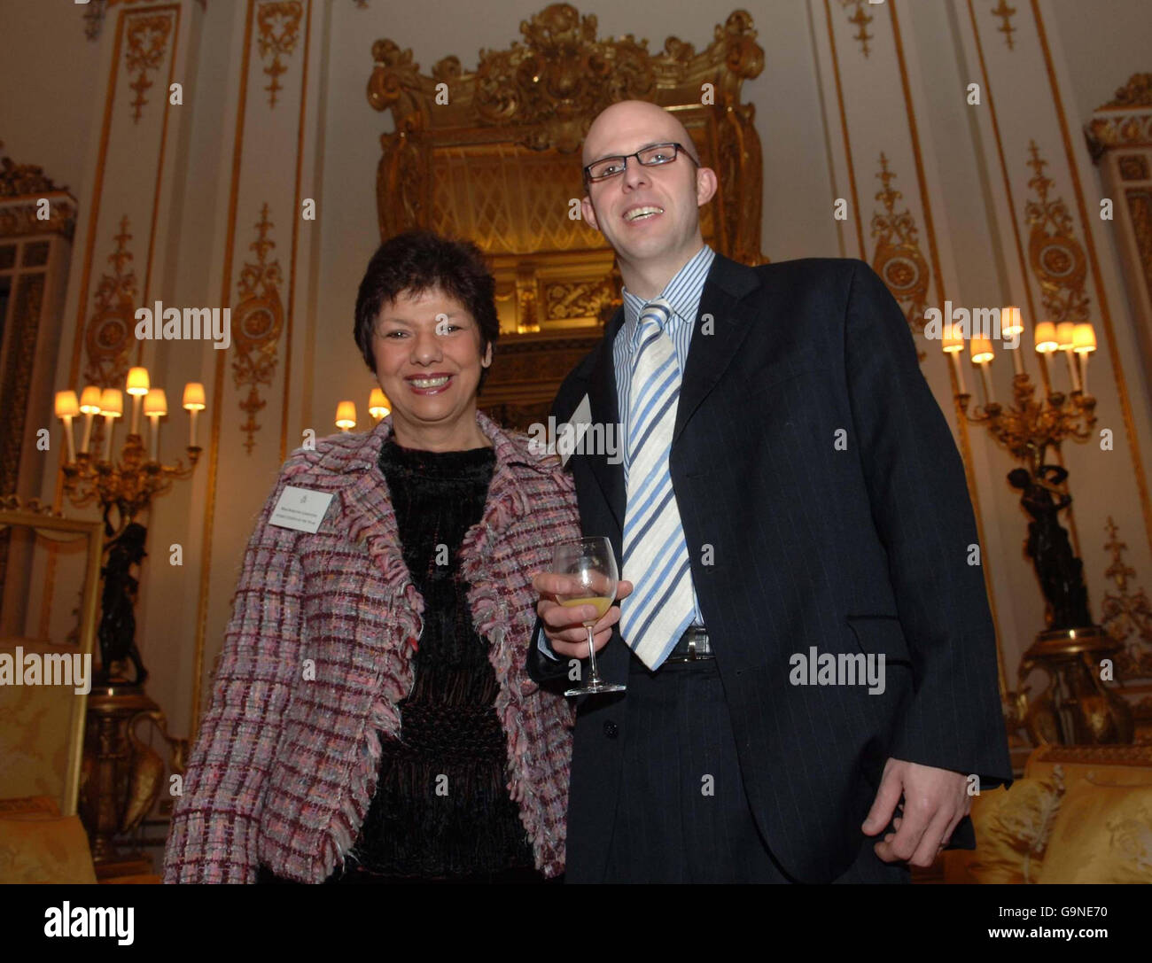 Dot Griffiths with son Robert Irving at a Buckingham Palace reception to honour the country's top achievers. Stock Photo