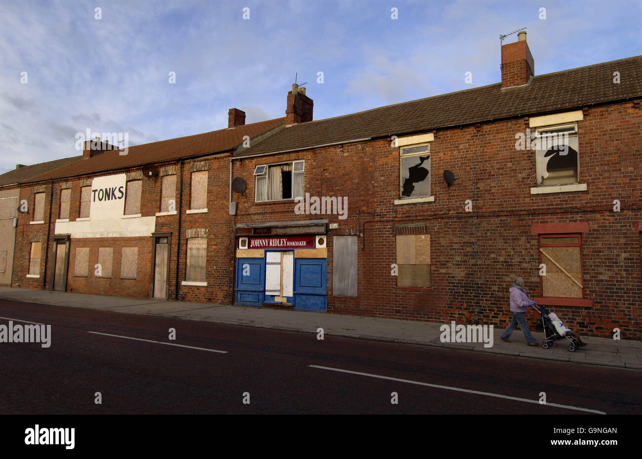 Urban decay. Boarded-up shops and houses at Wingate near Durham. Stock Photo