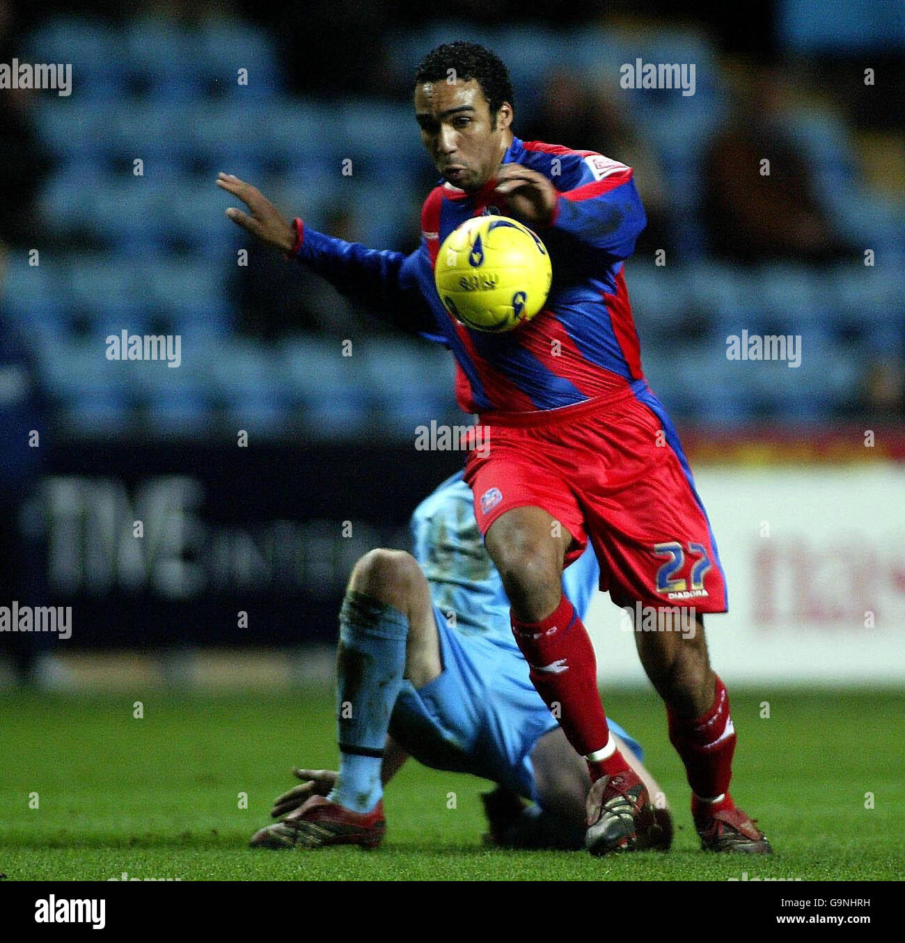 Crystal Palace's Paul Ifill skips a challenge to surge into the Coventry danger area during the Coca-Cola Championship match at the Ricoh Arena, Coventry. Stock Photo