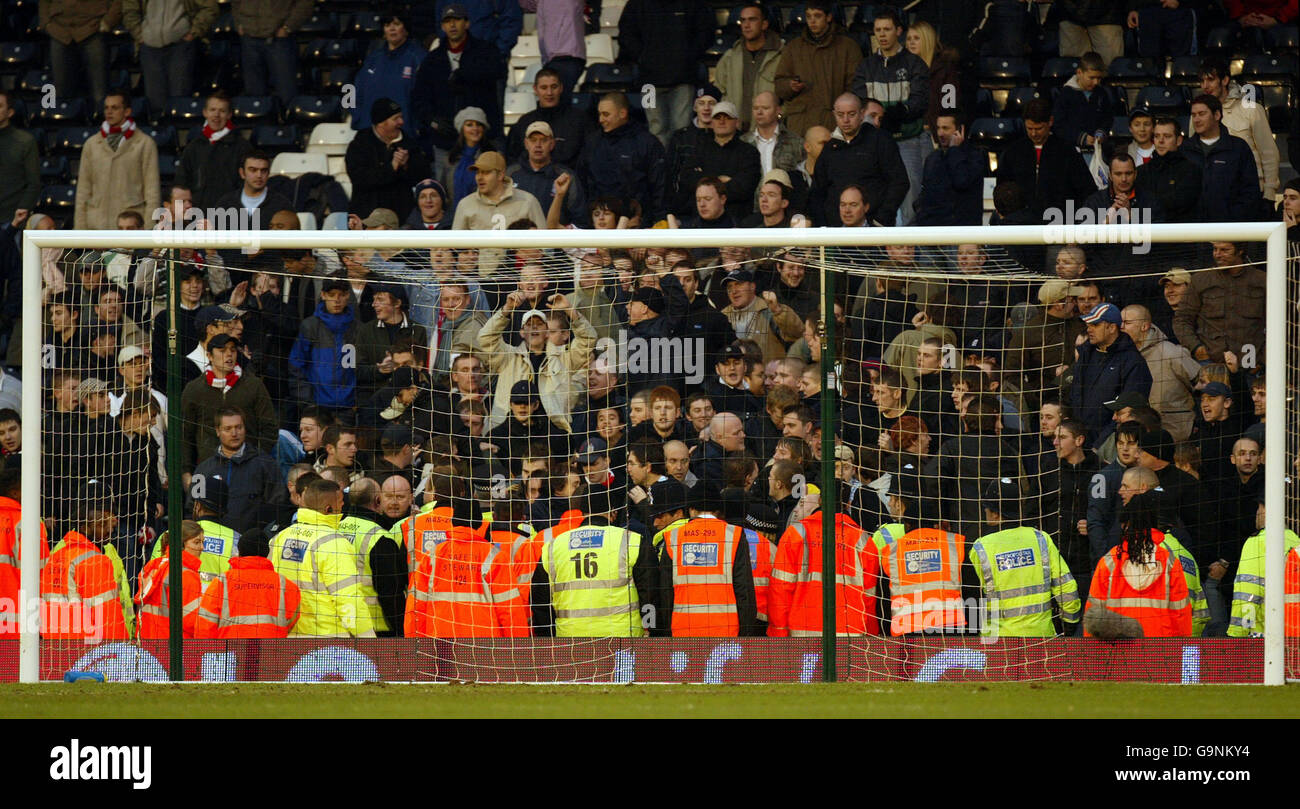 Police stadium security mob the rear of the fulham goal hi-res stock  photography and images - Alamy