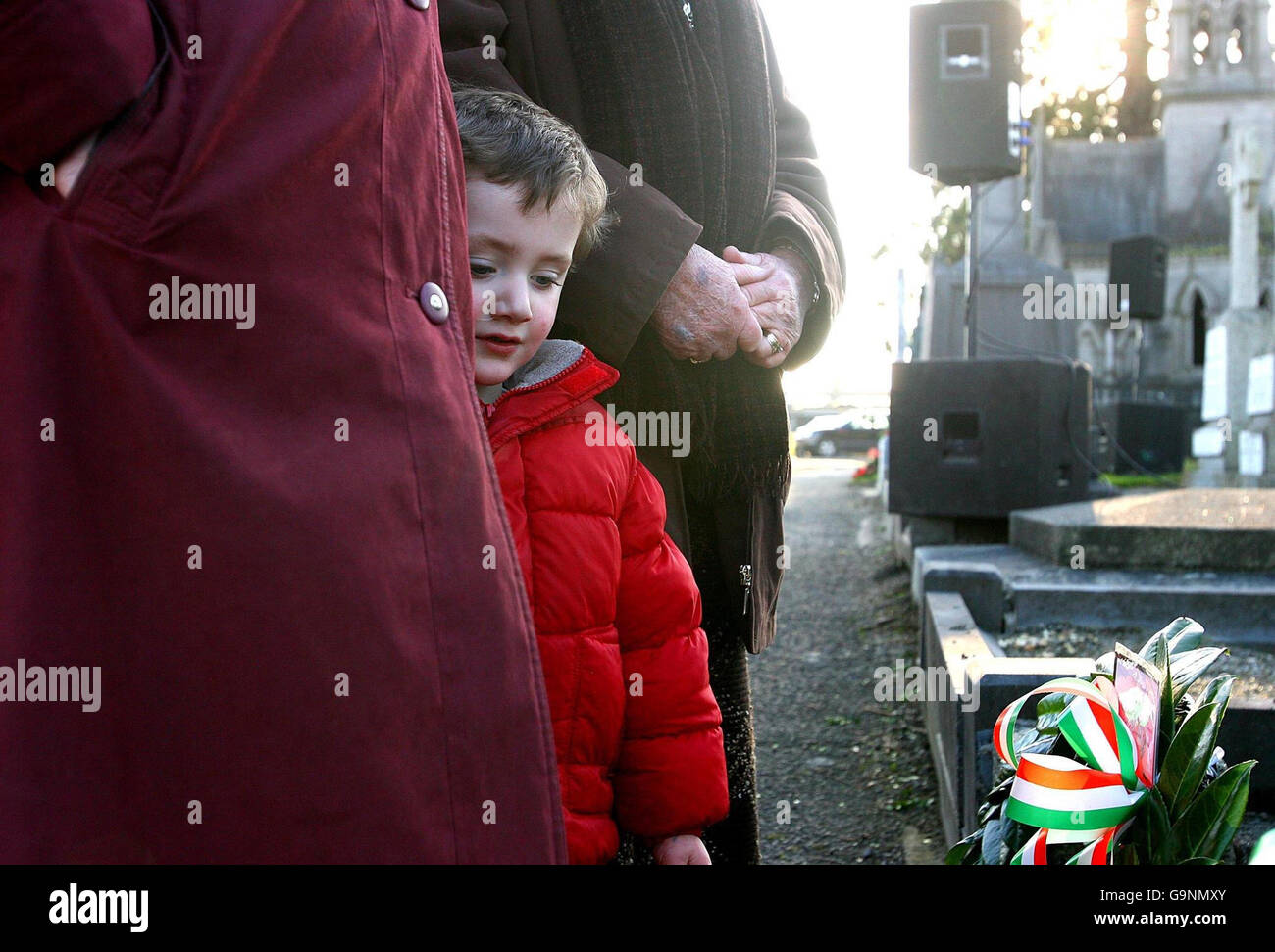 Three-year-old Cillian Cooney, great-great grandson of Jim Larkin at his graveside in Glasnevin Cemetery, Dublin, at an event marking the centenary of a dockers strike led by Larkin. PRESS ASSOCIATION Photo. Stock Photo