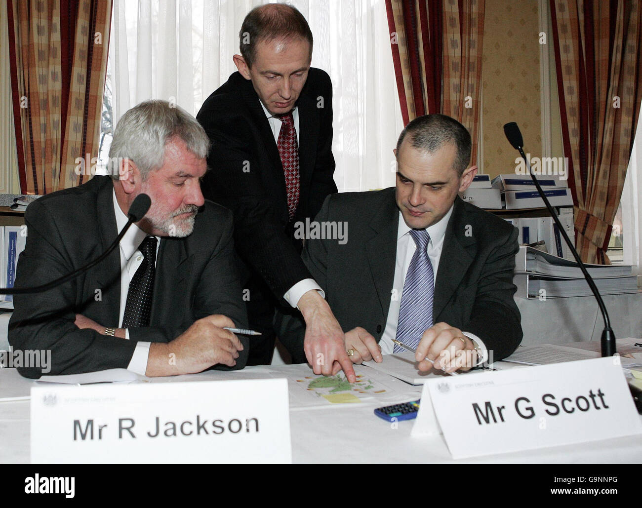 Scottish executive inquiry reporters left to right hires stock