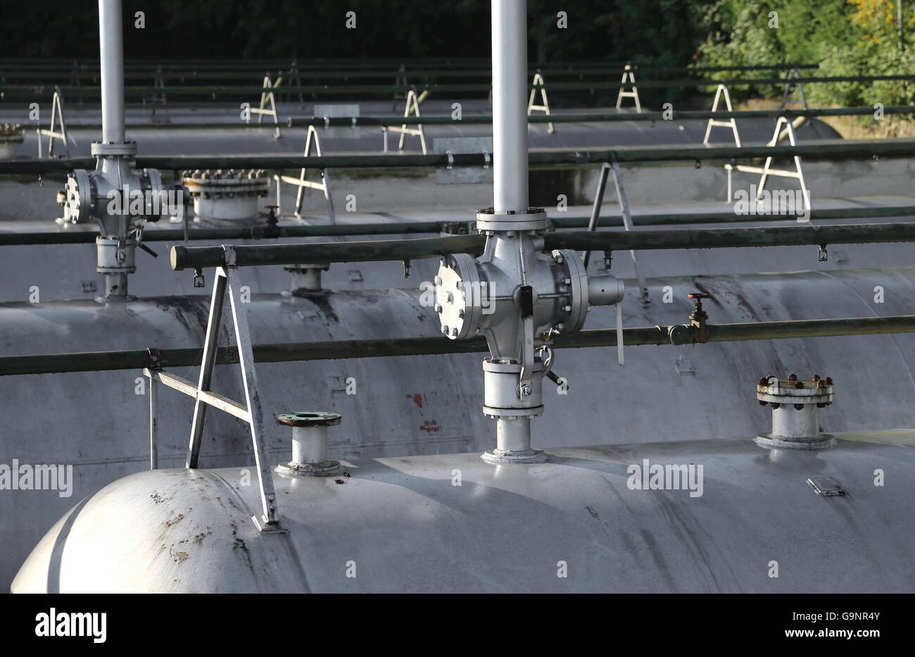 huge long gas tank in a refinery factory construction and storage of