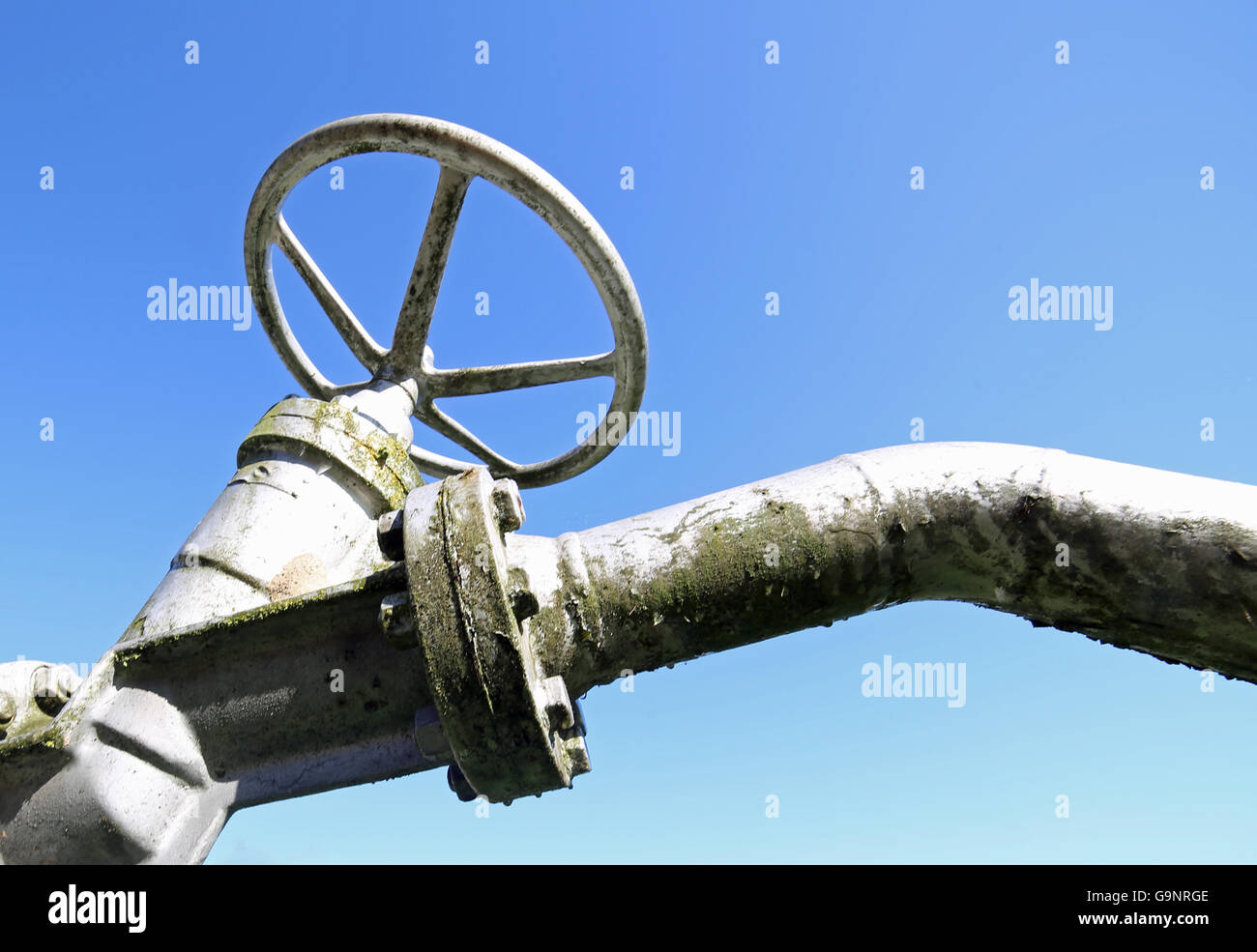 huge valve for closing and opening gas pipeline of the industrial plant conduct of a company multiservice Stock Photo