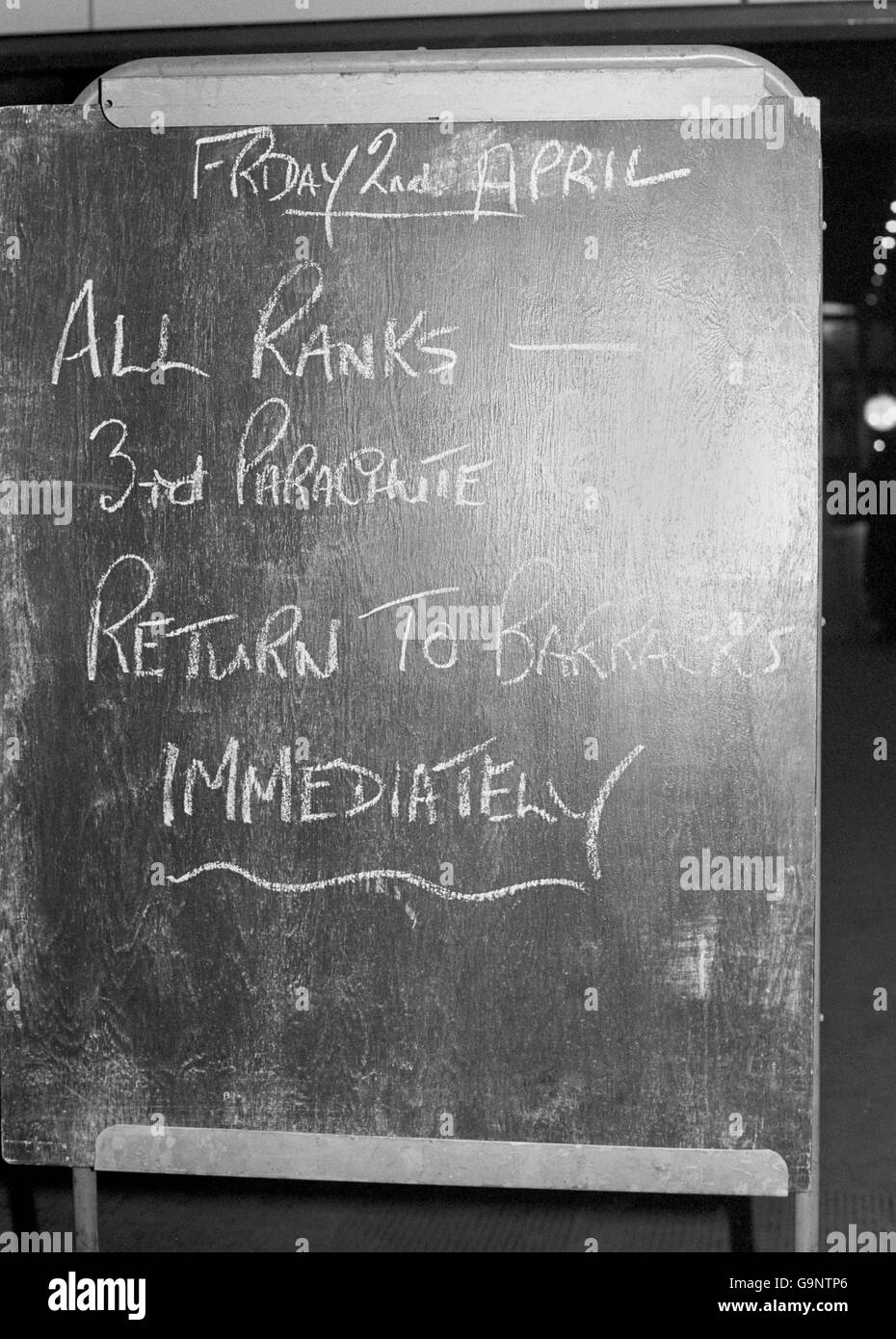 A chalked blackboard sign posted at Kings Cross railway station. The Falkland islands were invaded by Argentinian forces. Stock Photo