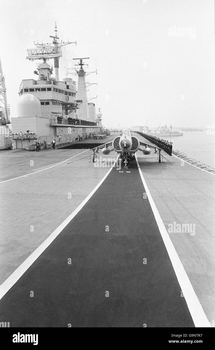 A Sea Harrier on the flight deck of HMS Illustrious as she sailed from Posrtsmouth to the Falkland Islands. Stock Photo