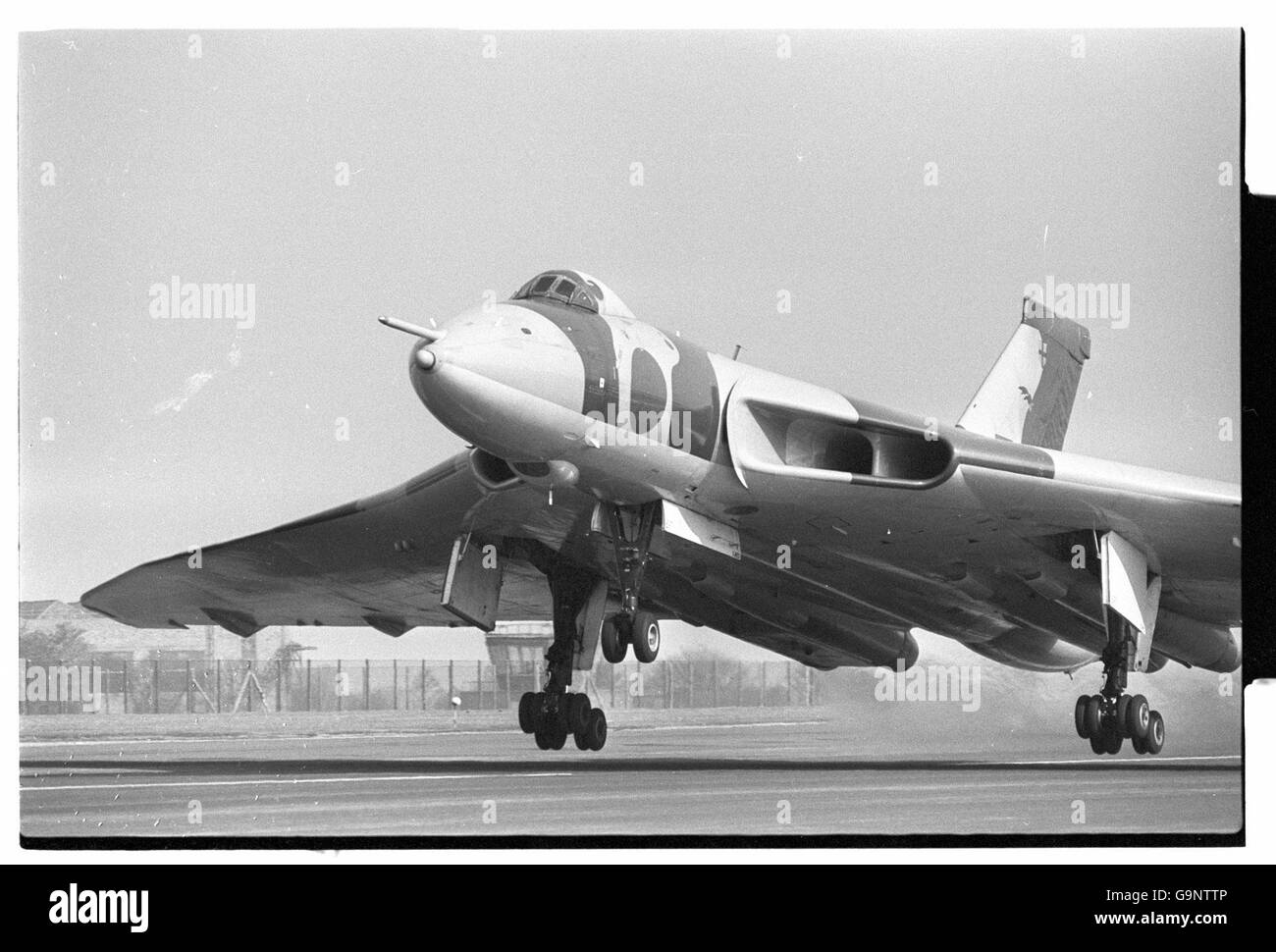 A Vulcan bomber lifting off from its base at RAF Waddington, Lincolnshire. Stock Photo