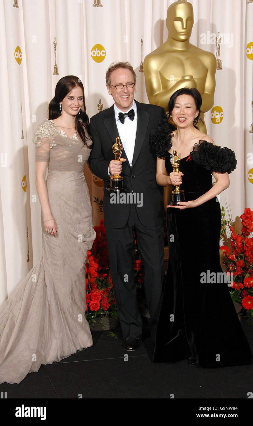 Presenter Eva Green (left) poses with Ruby Yang, and Thomas Lennon, who received the Oscar for Best Documentary Short Subject for 'The Blood of Yingzhou District', during the 79th Academy Awards (Oscars) at the Kodak Theatre, Los Angeles. Stock Photo