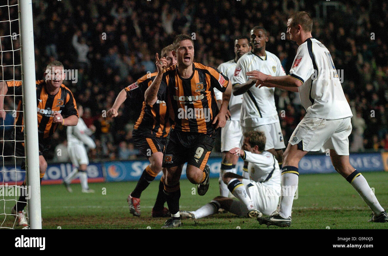 Hull's Nicky Forster (centre) celebrates his equaliser during the Coca ...