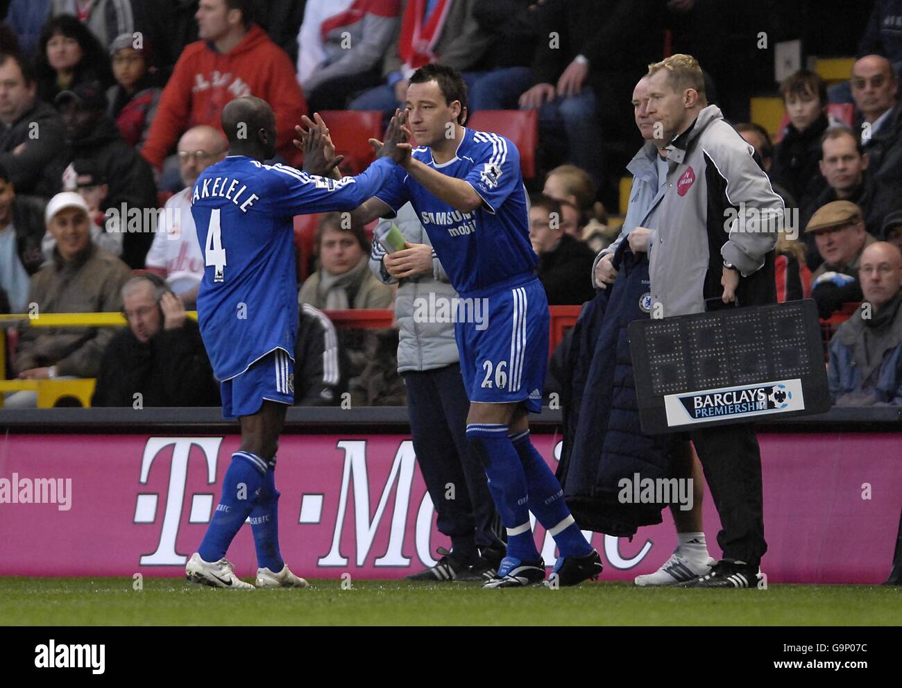 Soccer - FA Barclays Premiership - Charlton Athletic v Chelsea - The Valley. Chelsea's John Terry comes off the bench to replace teammate Claude Makelele (l) after returning from injury Stock Photo