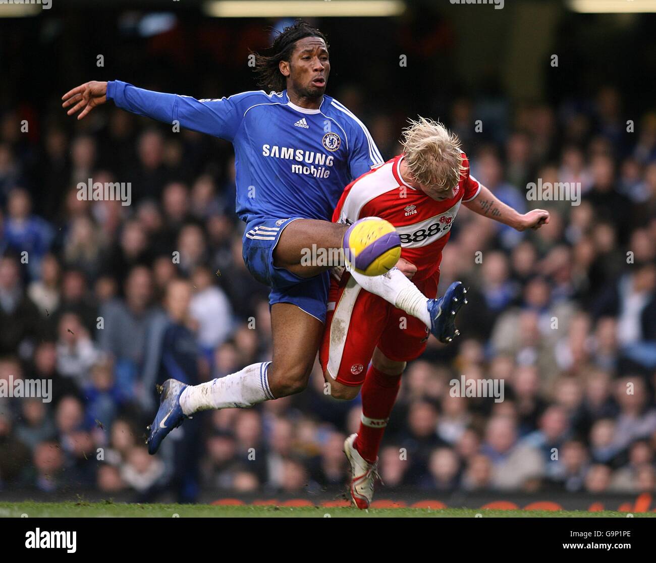 Soccer - FA Barclays Premiership - Chelsea v Middlesbrough - Stamford Bridge. Chelsea's Didier Drogba and Middlesbrough's Andrew Davies(right) Stock Photo