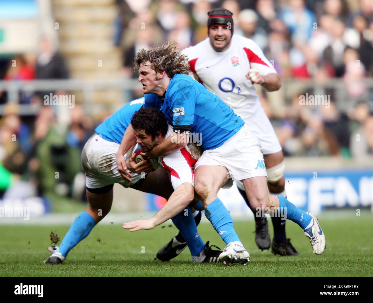 England's Andy Farrell (bottom) is tackled by Mirco Bergamasco of Italy during the RBS 6 Nations match at Twickenham, London. Stock Photo