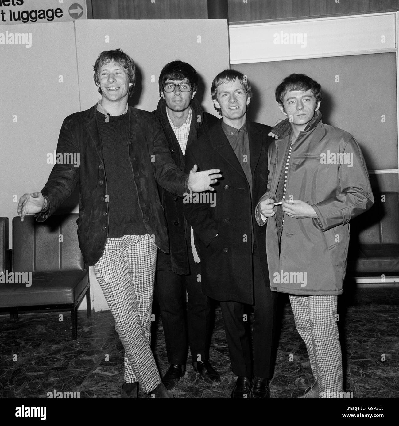 Pop Band Manfred Mann arrive back from a visit to Australia. (l-r) Paul Jones, Manfred Mann, Mike Vickers and Mike Hugg. The fifth band member, Tom McGuinness, was still in customs when the photograph was taken. Stock Photo