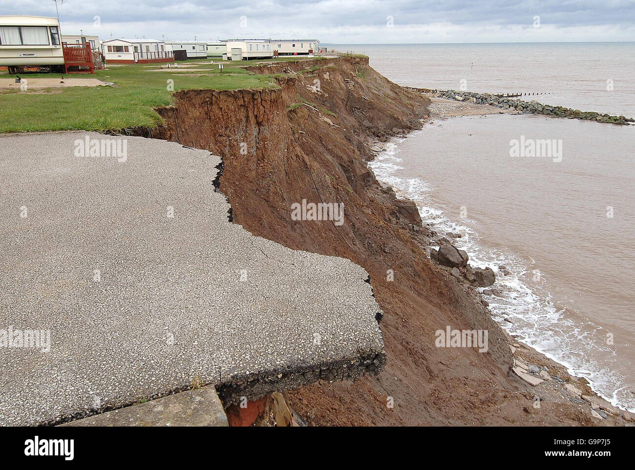 Caravans between Hornsea and Withernsea in Yorkshire, which now lie on the brink of the East Coast after 15 metres of land was swept away this winter following the heavy rainfalls. Stock Photo