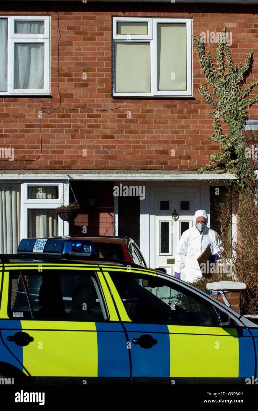 A forensic officer outside a house in Coventry Close, Werrington