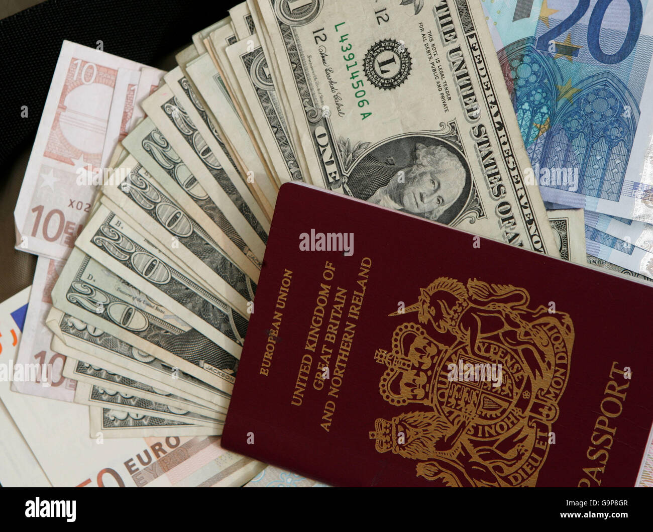 Generic personal finance pics. Money and Passport for foreign travel. Stock Photo