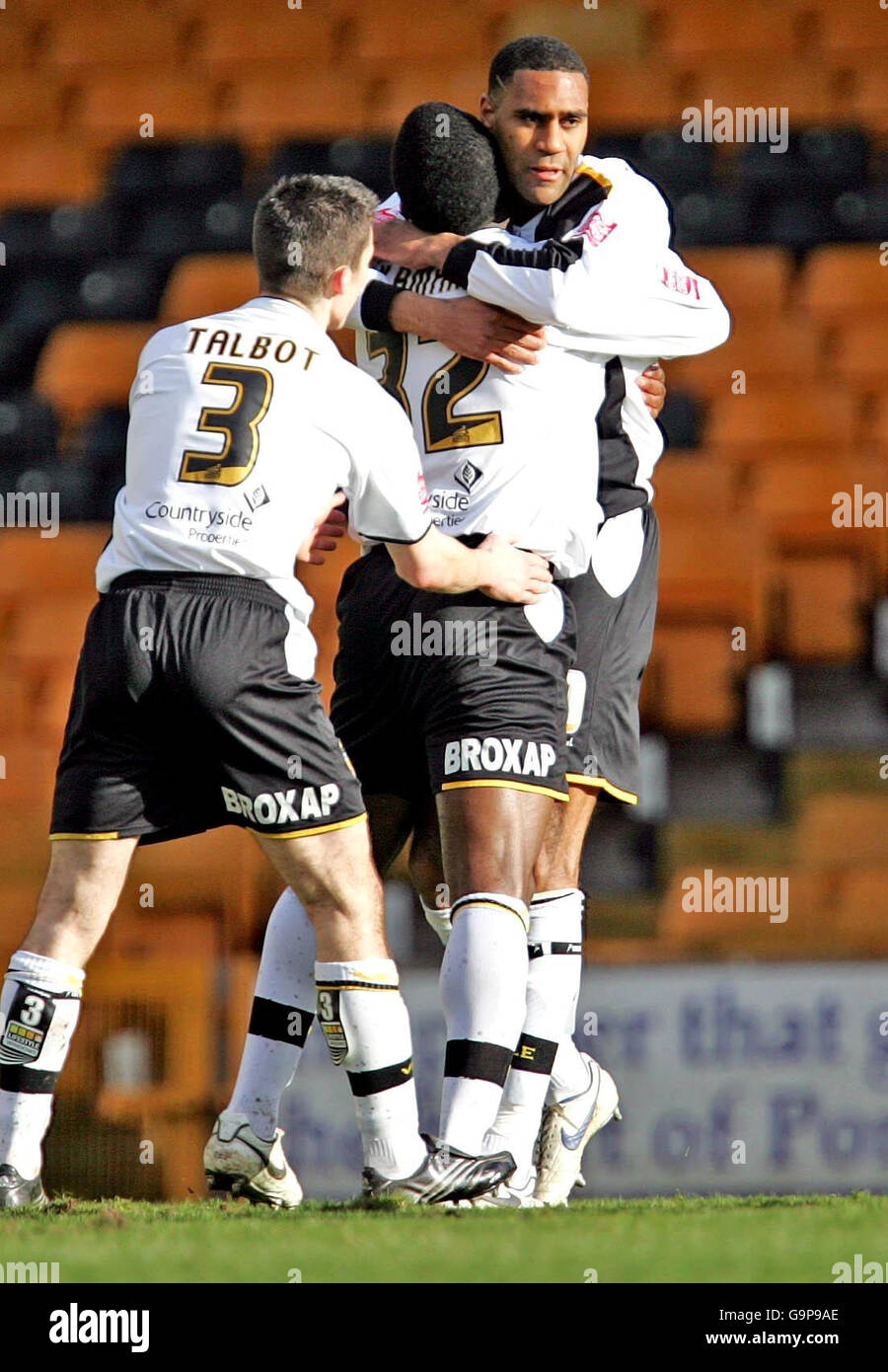 Port Vale's Leon Constantine (right) celebrates scoring the first goal with team-mates Jason Talbot (left) and Malvin Kamara during the Coca-Cola Football League One match at Vale Park, Stoke-on-Trent. Stock Photo