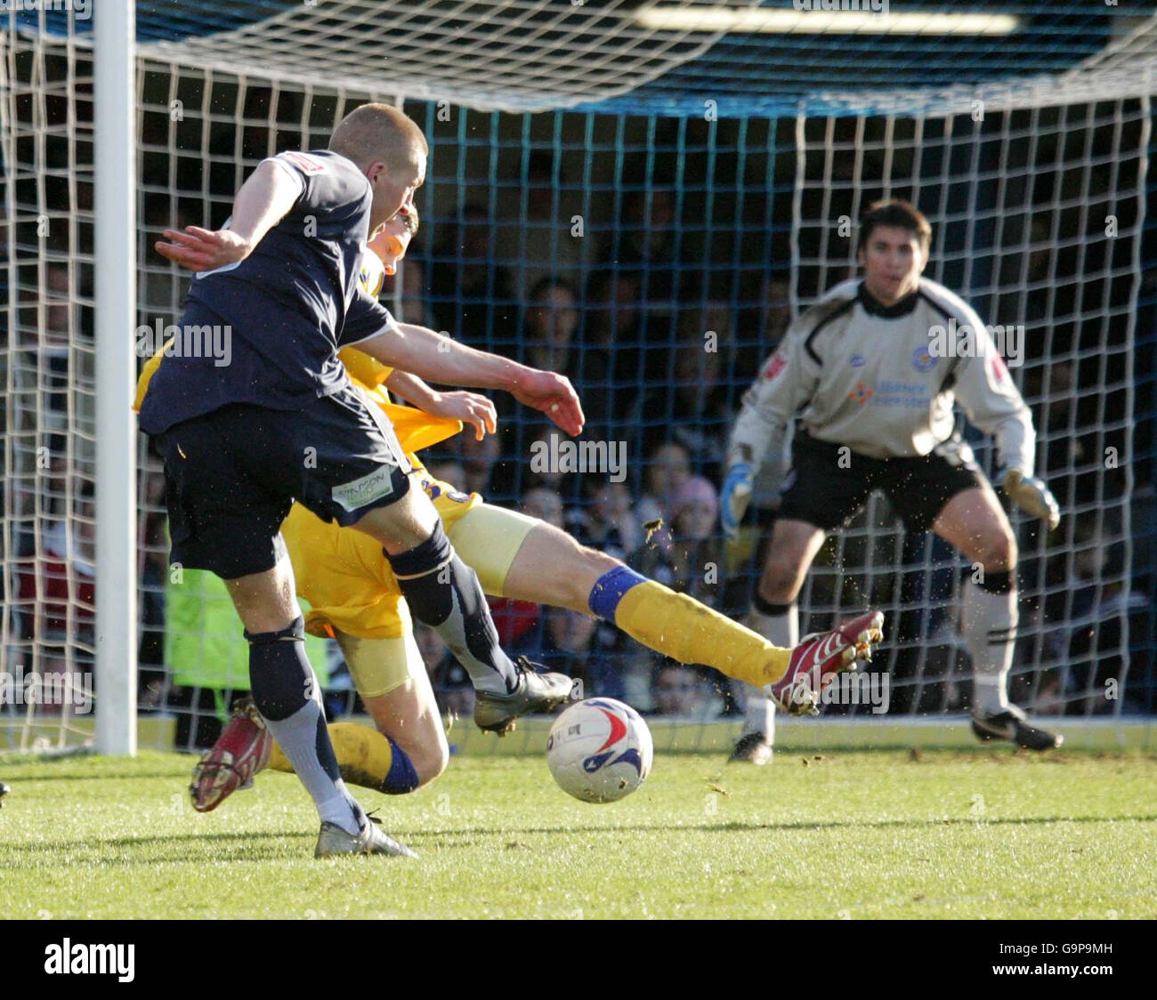 Freddy Eastwood (left) scores a goal during the Coca-Cola Football League Championship match at Roots Hall, Southend-on-Sea. Stock Photo