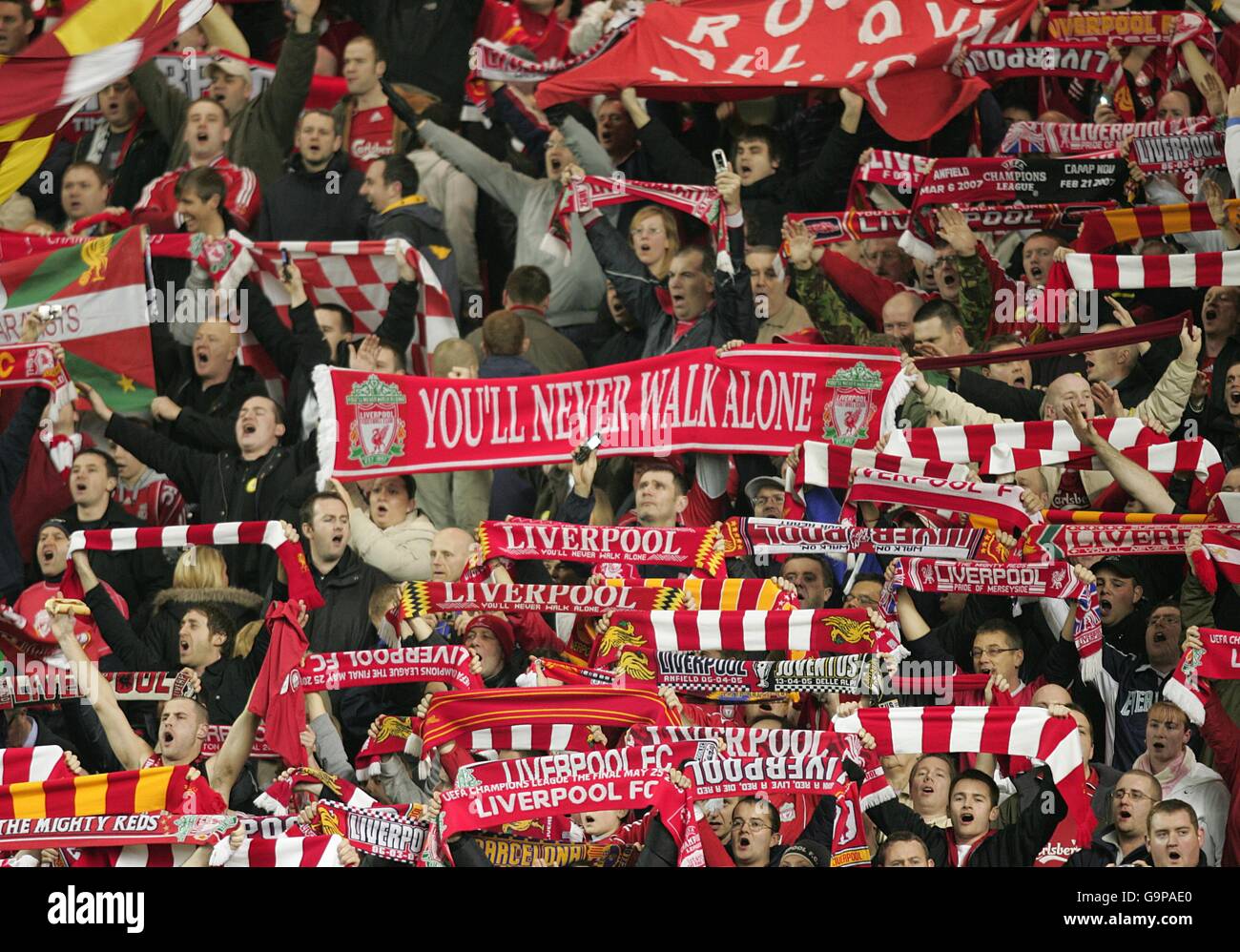 Soccer - UEFA Champions League - First Knockout Round - Second Leg - Liverpool v Barcelona - Anfield. Liverpool fans sing 'You'll Never Walk Alone' Stock Photo