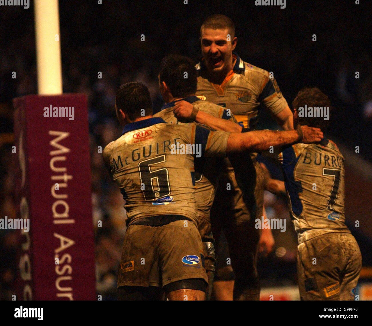 Leeds Rhinos team celebrate Kevin Sinfield's (second from left) during the Engage Super League match at Headingley Stadium, Leeds. Stock Photo