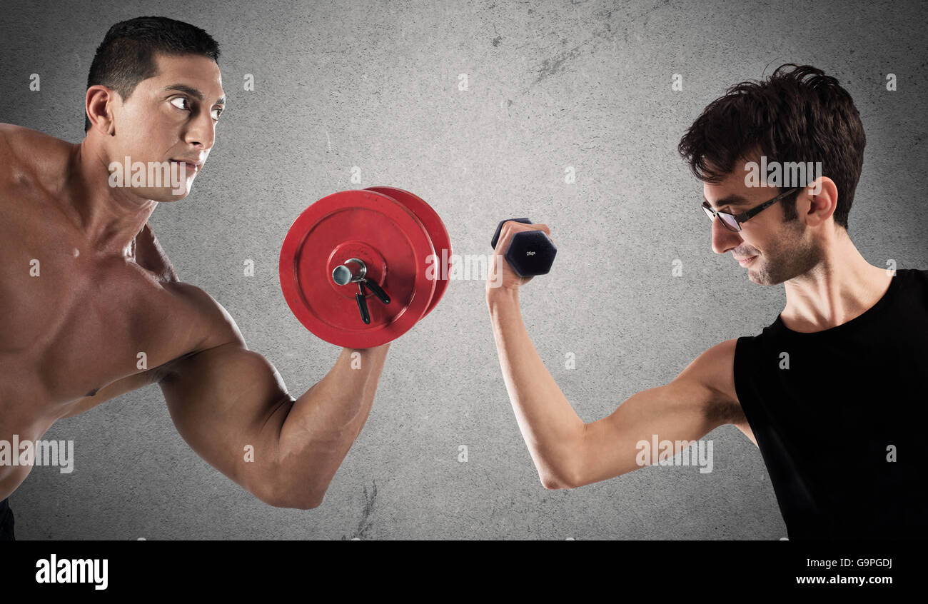 Ironic comparison of muscle strength Stock Photo