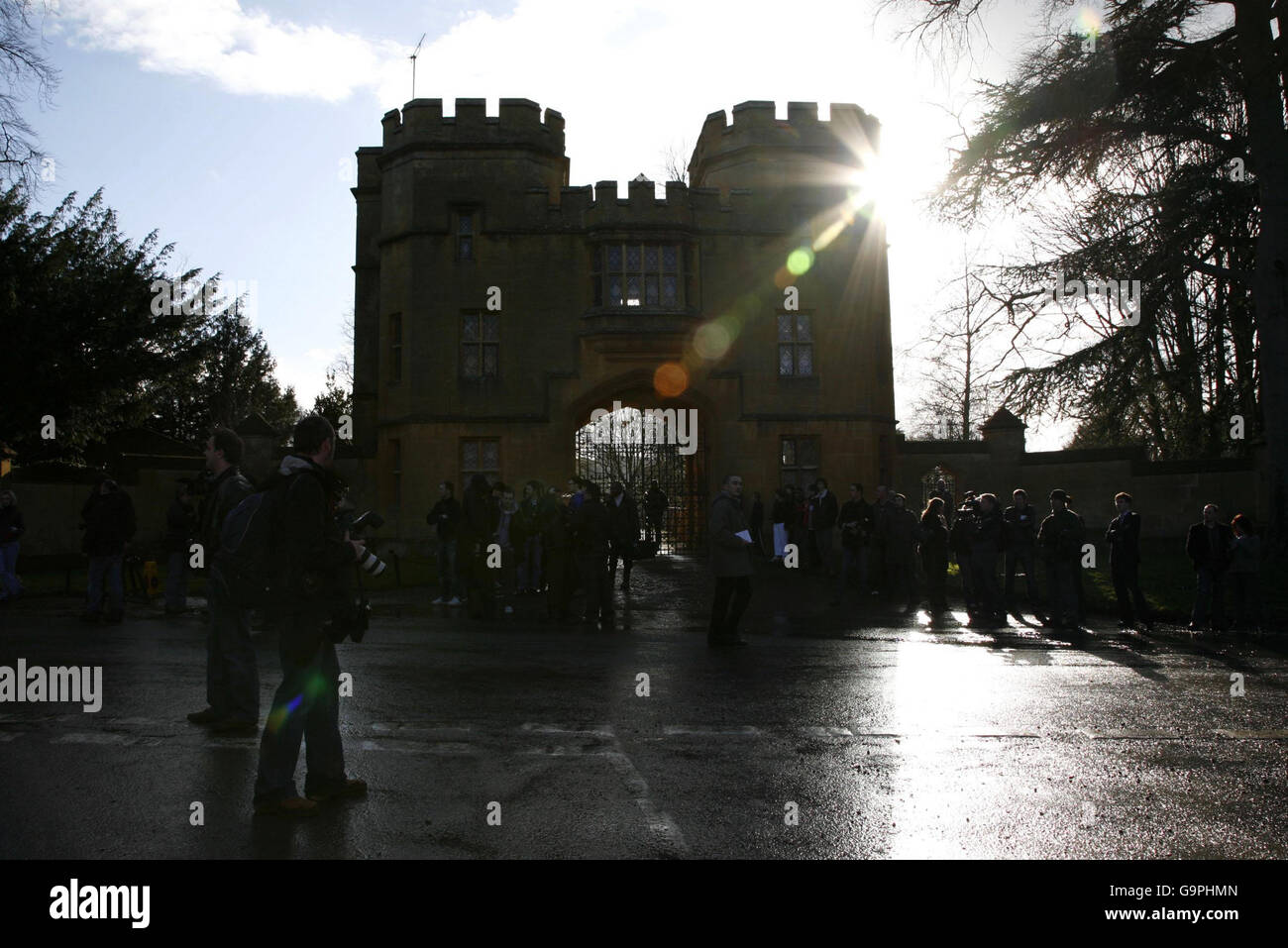 Media wait outside the entrance to Sudeley Castle in Gloucestershire for guests to arrive at a service to celebrate the marriage of Liz Hurley and Indian businessman Arun Nayar. Stock Photo