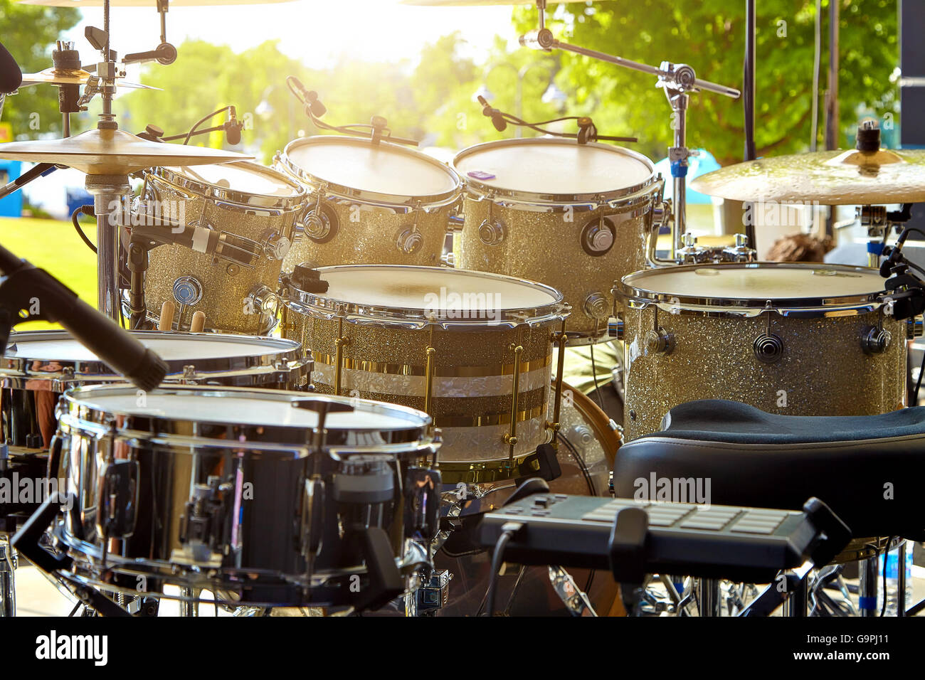 Acoustic drum set on stage before the concert Stock Photo - Alamy