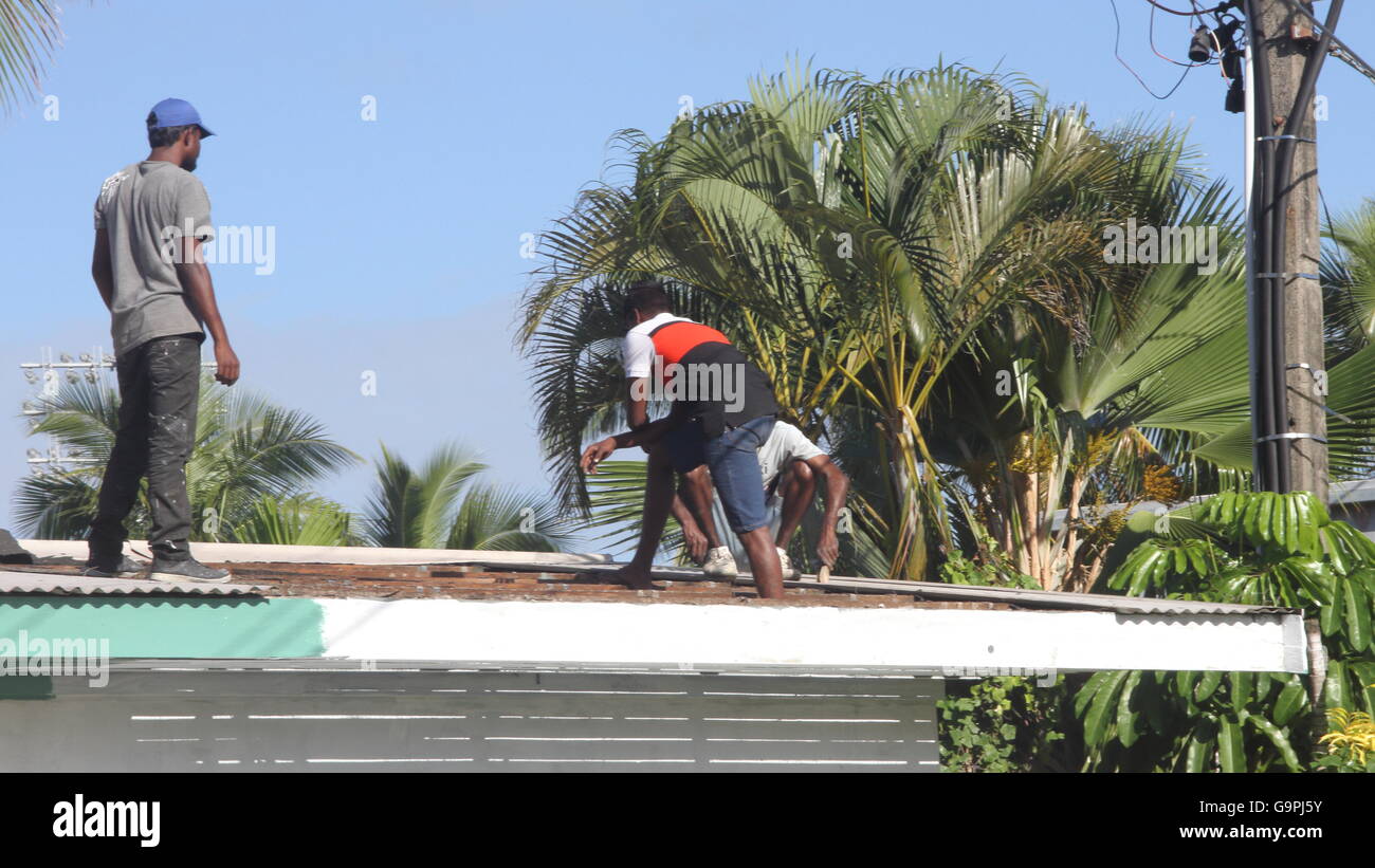 Repairing a roof in Suva, Fiji Stock Photo Alamy