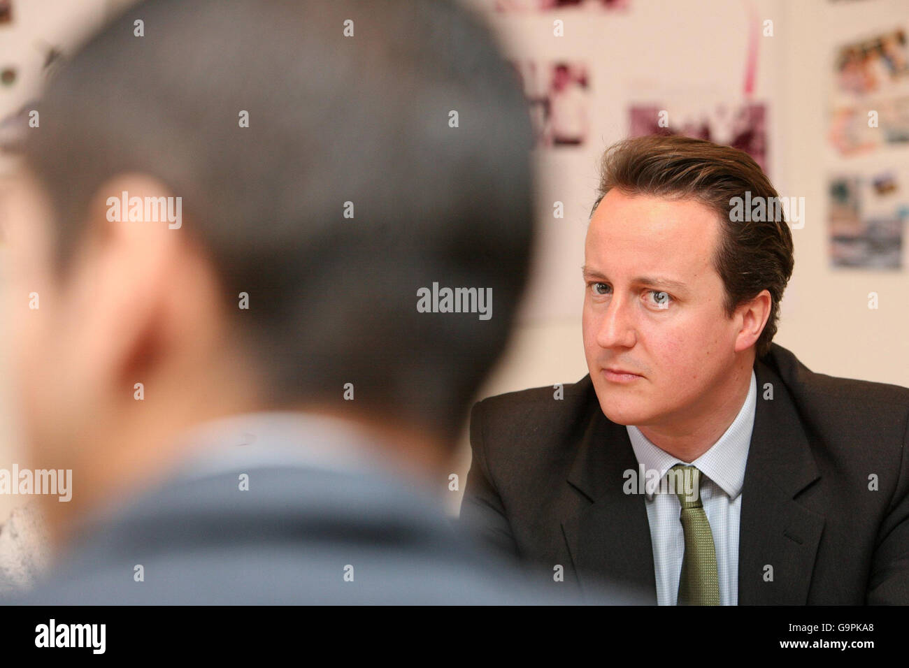 The Conservative Party Leader David Cameron Listens To Young Men And Women During A Visit To Spear A Skills And Personal Development Charity For Young People In Hammersmith West London Stock Photo