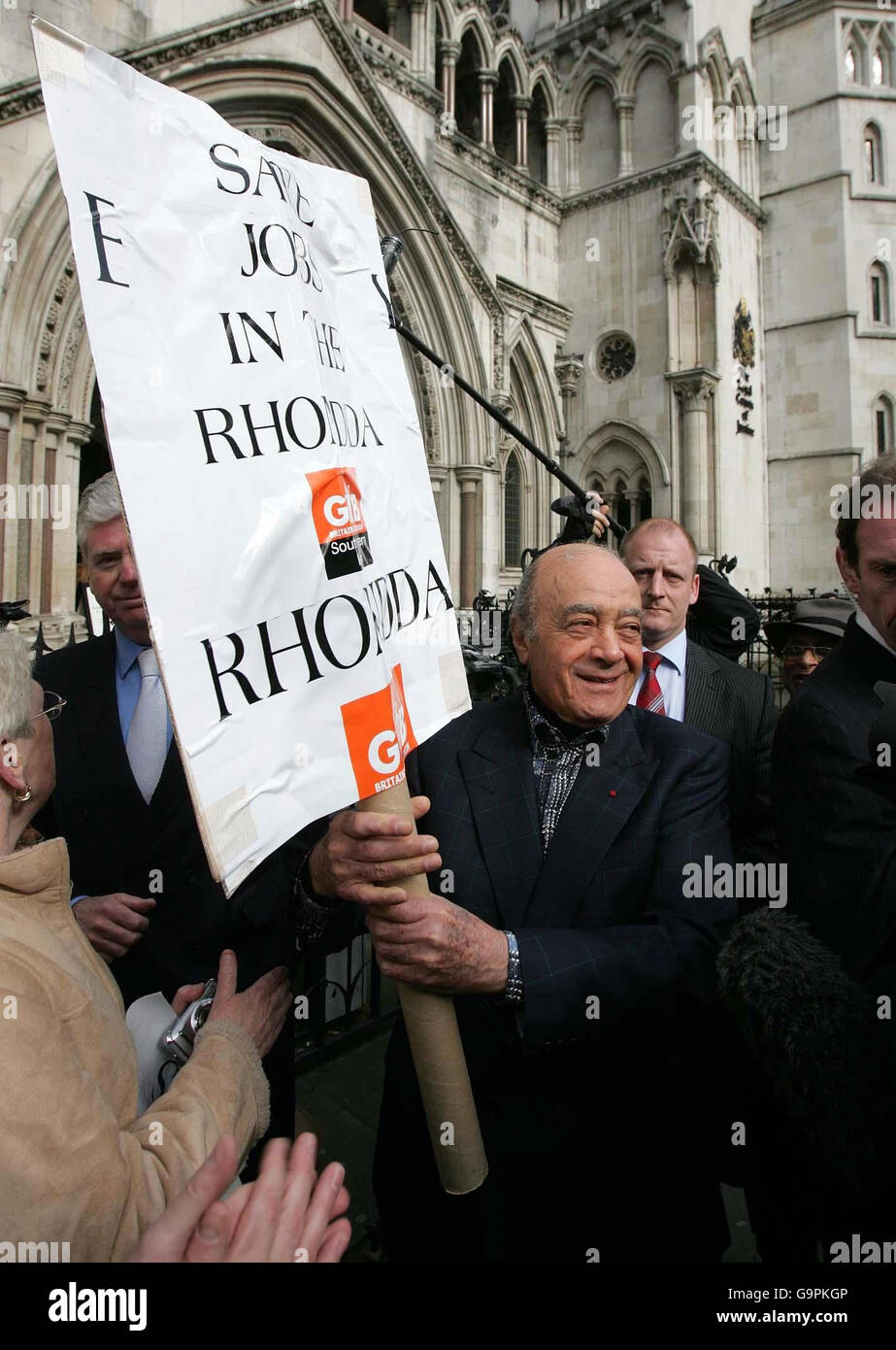 Harrods owner Mohamed al Fayed meets Welsh Burberry workers facing  redundancy from the company outside the High Court Stock Photo - Alamy