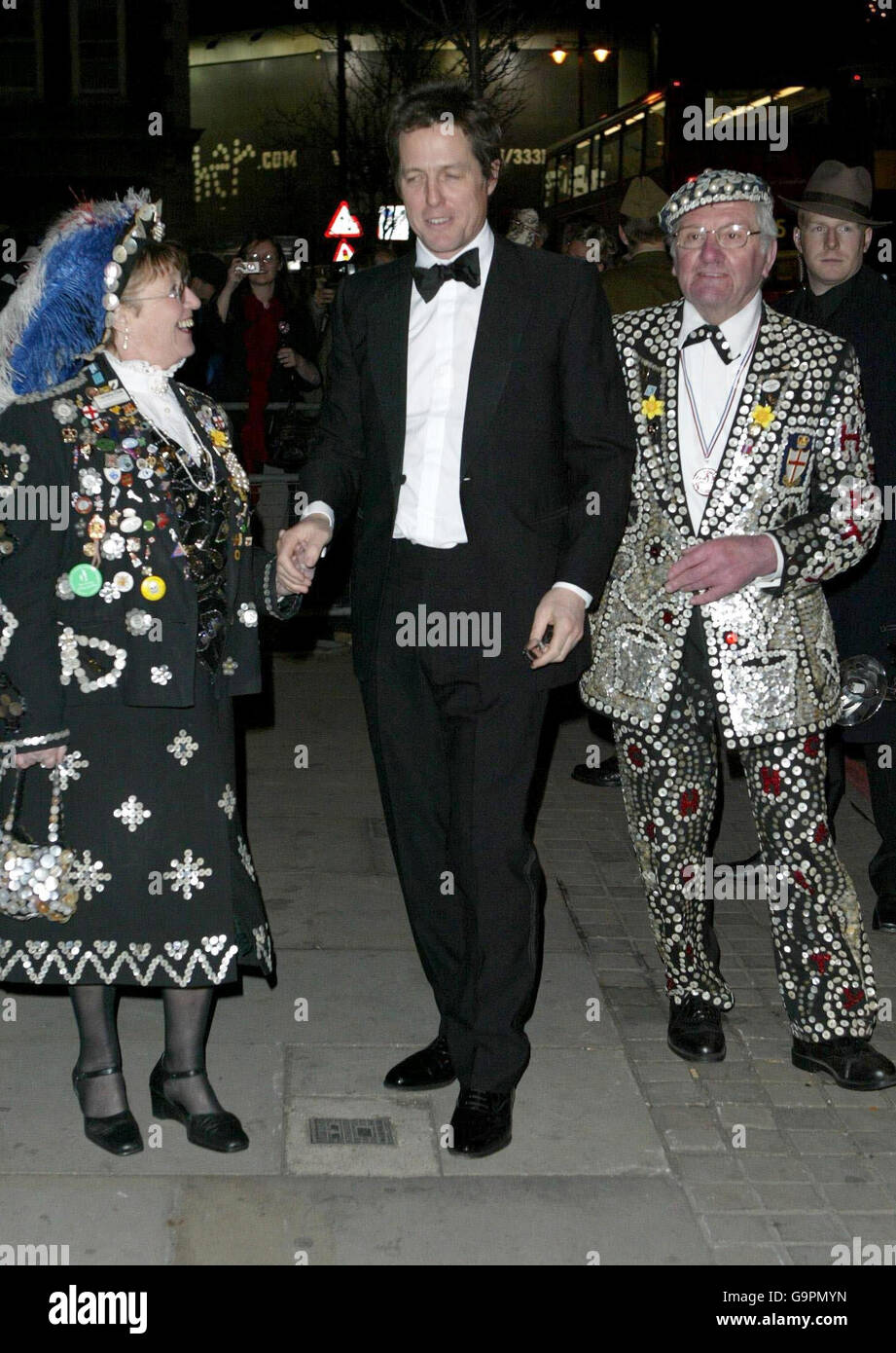 Hugh Grant arrives for a fancy dress party to celebrate Sir Elton John's 60th birthday, at Shoreditch Town Hall in east London. Stock Photo
