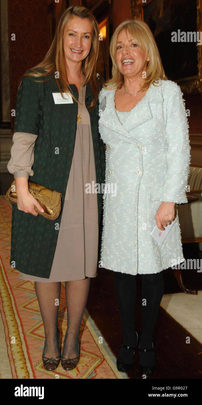 Anya Hindmarch, fashion designer (left), and Sarah Doukas, founder of Storm Model Management, at Buckingham Palace in London for a Woman in Business reception. Stock Photo