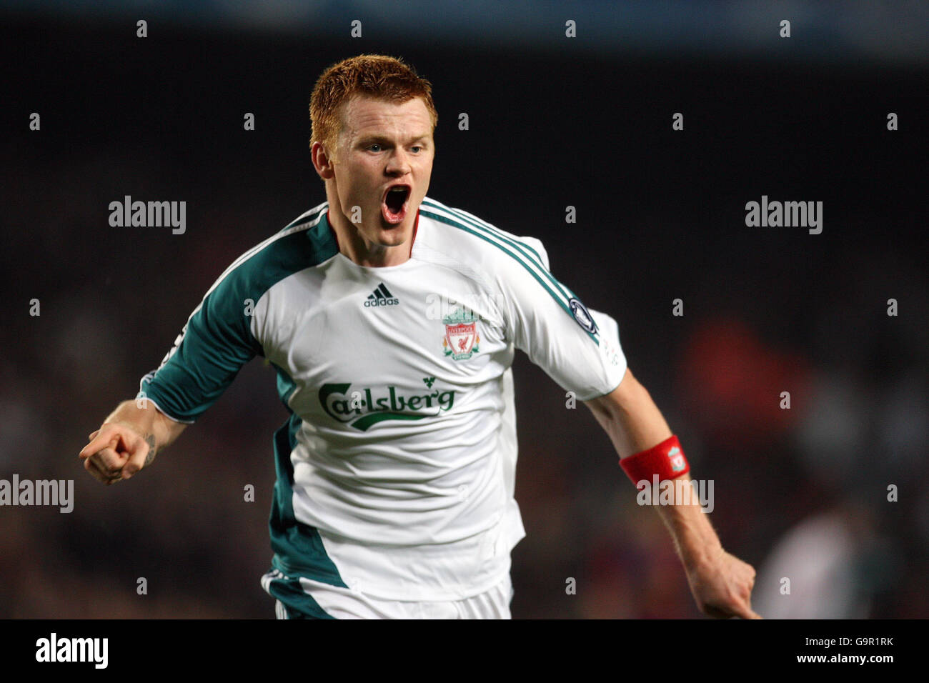 Liverpool's John Arne Riise celebrates scoring against Barcelona during the UEFA Champions League First Knockout Round First Leg match at Camp Nou, Barcelona. Stock Photo