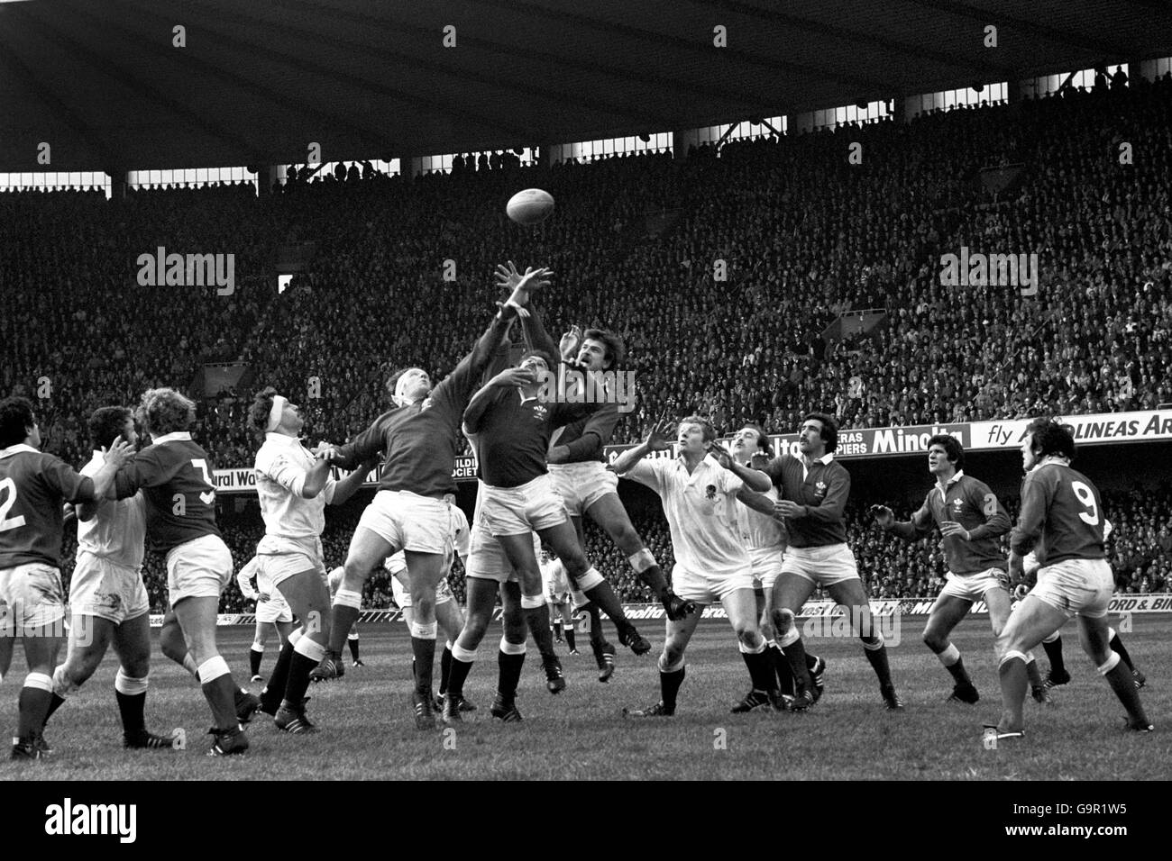 The Welsh trio of (L-R) Geoff wheel, Clive Davis and Ian Stephens outjump England in a line-out, while England captain Billy Beaumont (l) and team mate Mike Rafter (r) are the spectators. Wales went on to beat last season's Grand Slam champions by 21 points to nineteen. Stock Photo