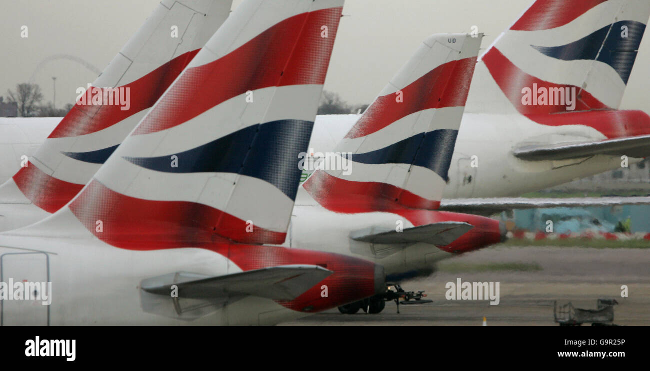 Generic transport pics. The tail fins of British Airways' aircraft parked at Temrinal One of London's Heathrow Airport. Stock Photo