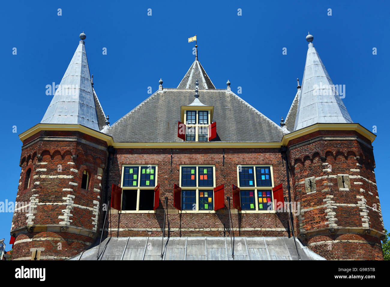 In De Waag, 15th century city gate which is now a restaurant in Nieuwmarkt Square, in Amsterdam, Holland Stock Photo