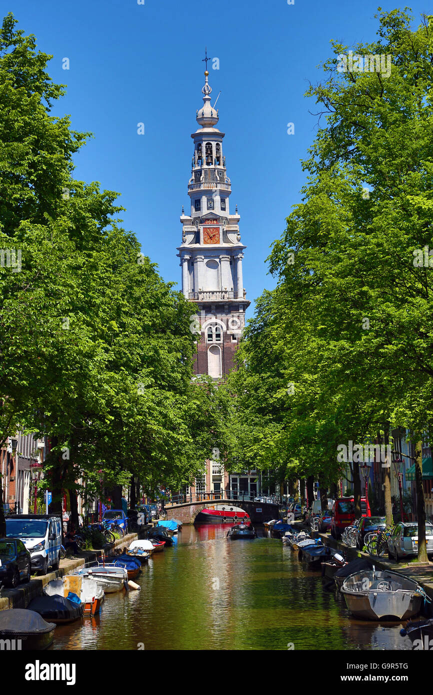 Tower of the Zuiderkerk, southern church, and the Groenburgwal canal in Amsterdam, Holland Stock Photo