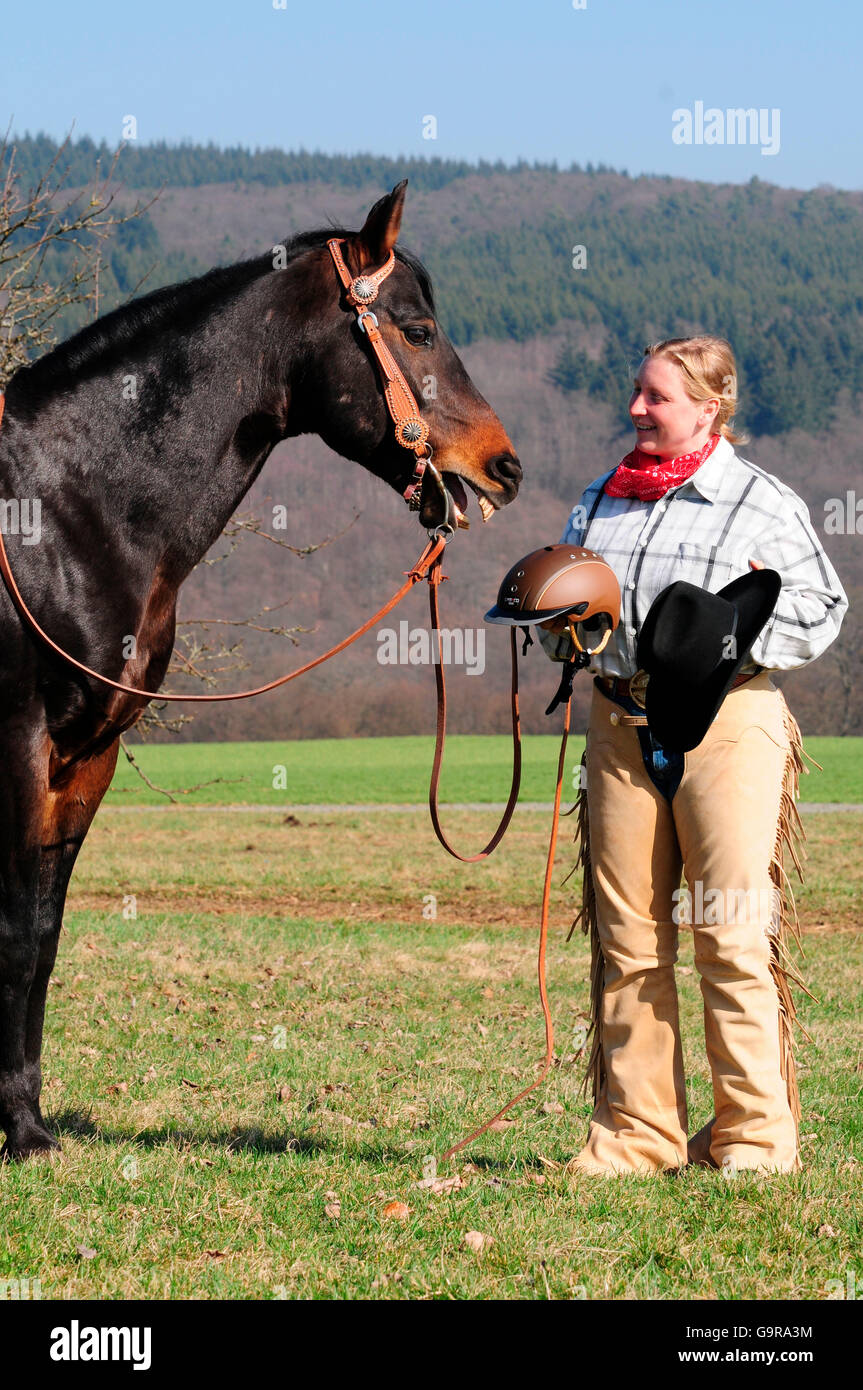 Woman with American Quarter Horse, stallion, western riding, crash