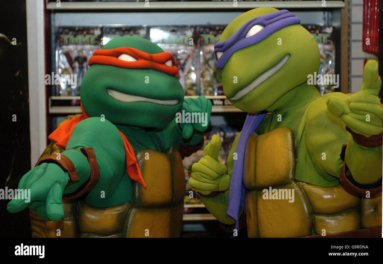 Teenage Mutant Ninja Turtles Raphael, left, and Michelangelo launch the new film, TMNT: The Movie, in London. Stock Photo