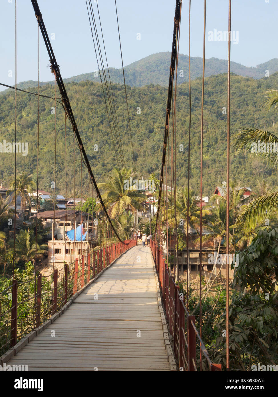 suspension bridge over Nam Ou river, province Phongsali, Laos, Asia / Muang Kua Stock Photo